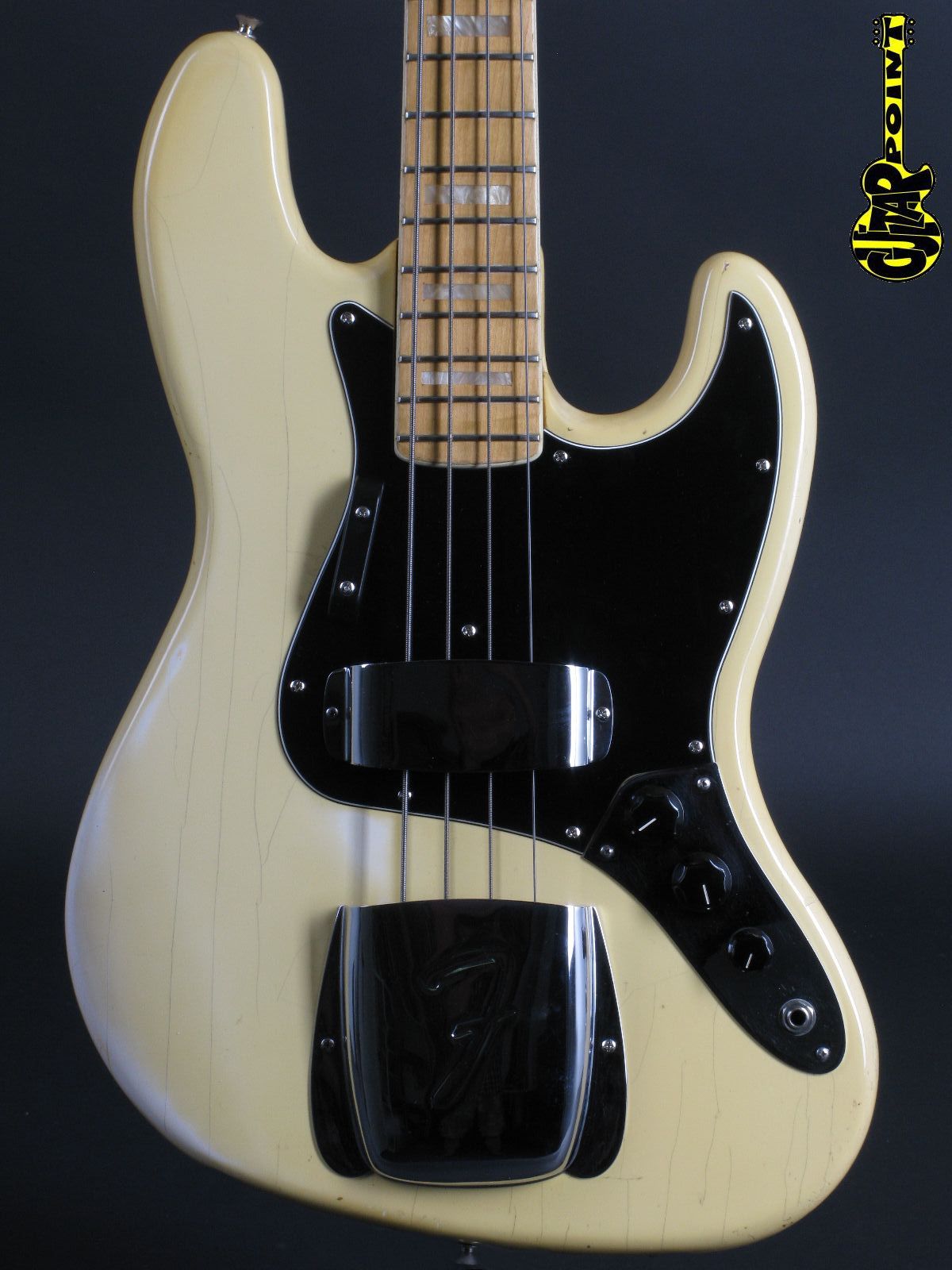 white jazz bass black pickguard