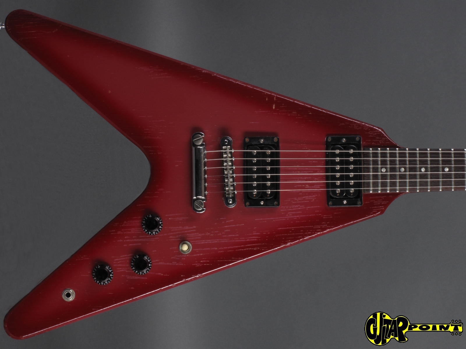 Pink flying v guitar on sale